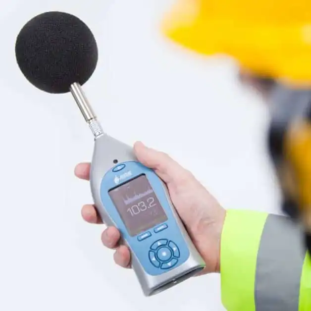 Engineer using a Nova Sound Level Meter to measure workplace noise levels